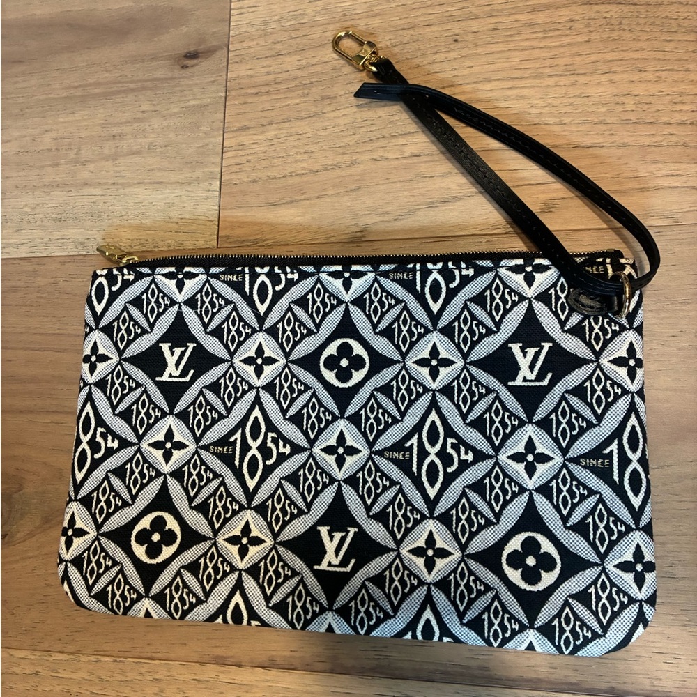 1854 Louis Vuitton wristlet. Authentic, In perfect condition, never used